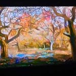 Kadr z filmu. Drzewa z różnokolorowymi liśćmi